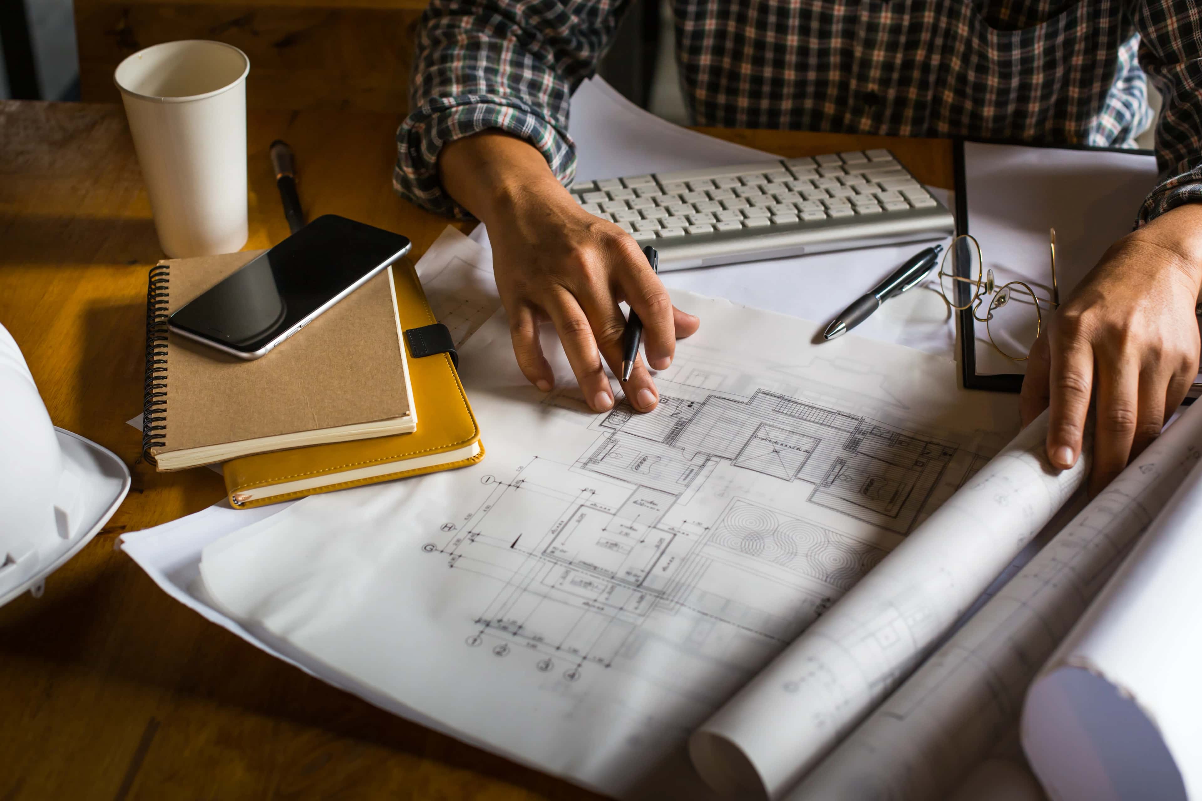 Architect's blueprint and drafting tools on a desk